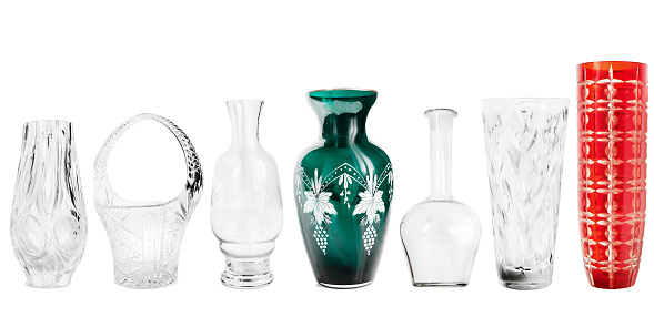Collection of vintage glass vases isolated on white background