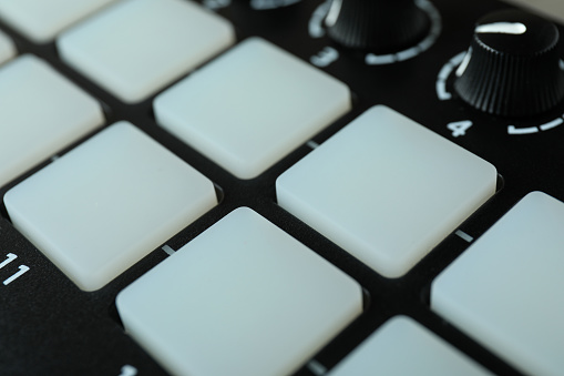 Midi keyboard all over background, close up