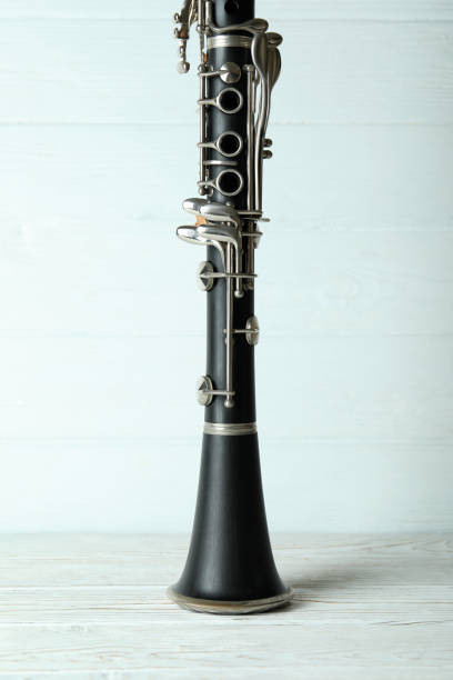 istock Clarinet musical instrument on white wooden background 1969491696