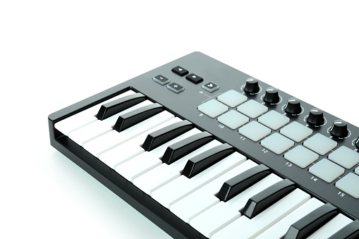 Midi keyboard digital instrument isolated on white background