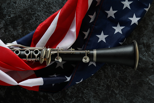 Clarinet and american flag on black smokey background