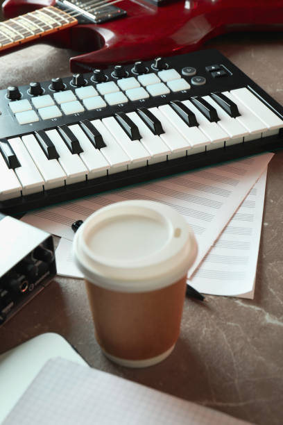 istock Musician workplace on gray textured table, close up 1969499223