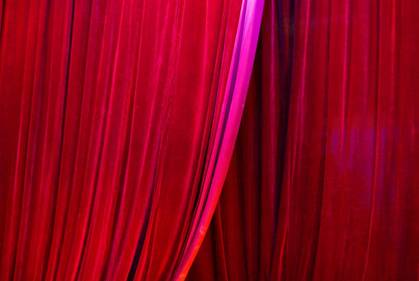 istock Red theater curtain with 1969531788
