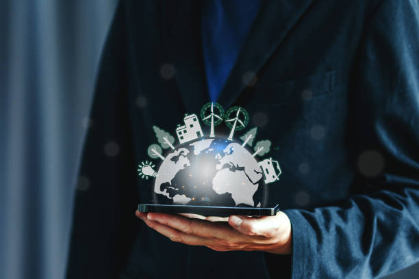 istock Energy saving world ecology concept. Businessman  with virtual energy resources Environment icon on Green technology and 1969600441