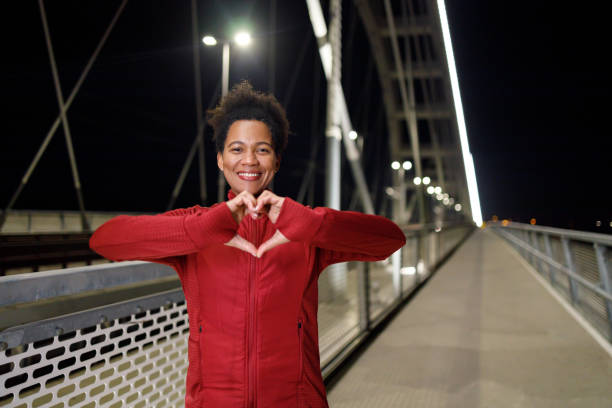 istock Woman's evening workout on city bridge 1969613742