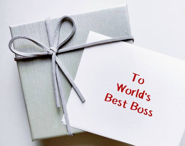 istock Gift box with note greeting card with text written TO WORLD's BEST BOSS, to say thanks or appreciation to beloved boss who doing his best to support staff efforts and put their best foot forward 1969623237