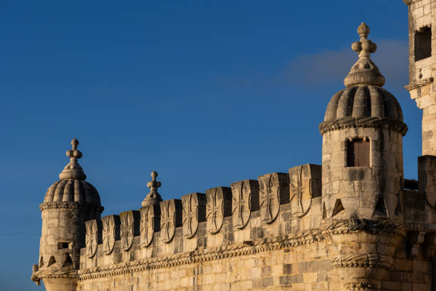 Belem Tower with the Tagus River in Lisbon Portugal during a clear day in Autumn.