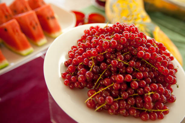 currants and berries, watermelon in the background
