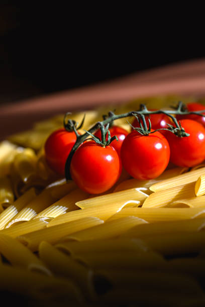Penne pasta with tomato sauce served on a white plate for a delicious italian meal