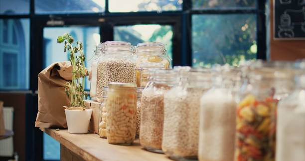 istock Local zero waste grocery store with bulk products in jars 1969707228
