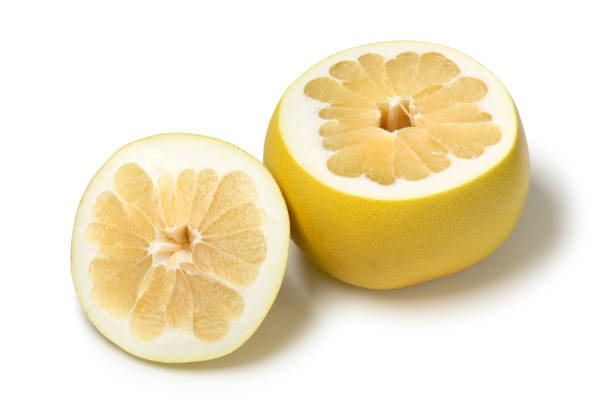 istock Halved white honey sweet fresh Pummeloon on white background close up 1969711462