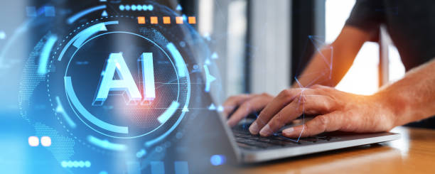 istock Man hands typing in laptop, AI hologram and machine learning 1969764829