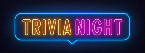 Trivia Night neon sign in the speech bubble on brick wall background.