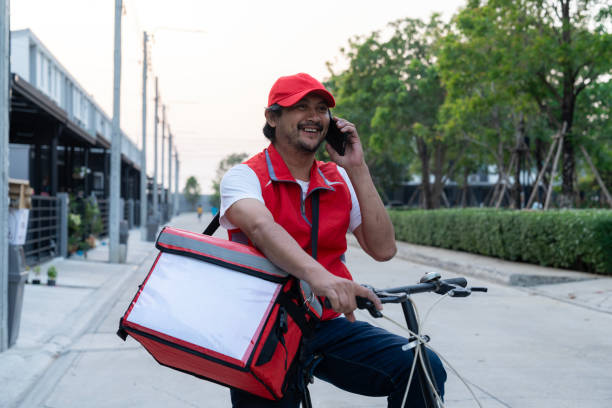 istock Food delivery personnel calling a customer 1969772349