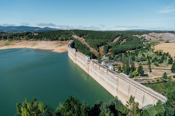 istock Hydroelectric dam with low water level in summer. Aguilar de Campoo, Spain 1969782835