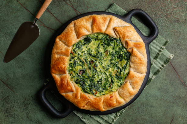 istock Spinach and Ricotta Galette, made with leek and eggs. Homemade savory pie. Top view. 1969817512