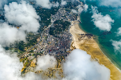 Aerial photography of beautiful clouds along the coastline\n​
