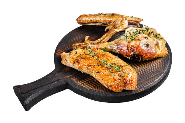 istock Butchered roast goose, breast fillet, wing, leg.  Isolated on white background. Top view. 1969856206