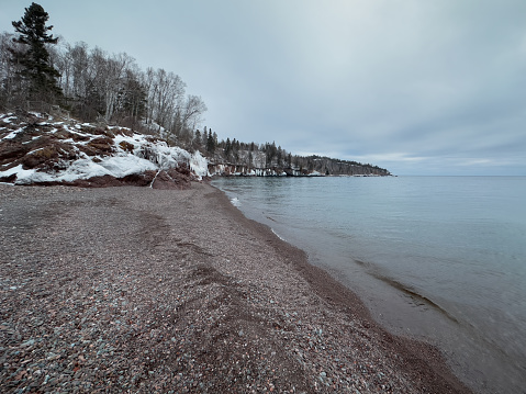 Rocks on the beach in Silver Bay, Minnesota in winter on Lake Superior.