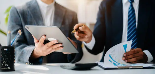when it comes to probate in texas, many people immediately think of family homes, vehicles, and bank accounts, businessman and team analyzing financial statement finance task with smart phone and laptop