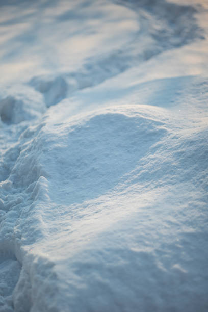 istock The tire tracks left by cars after heavy snowfall 1969875257