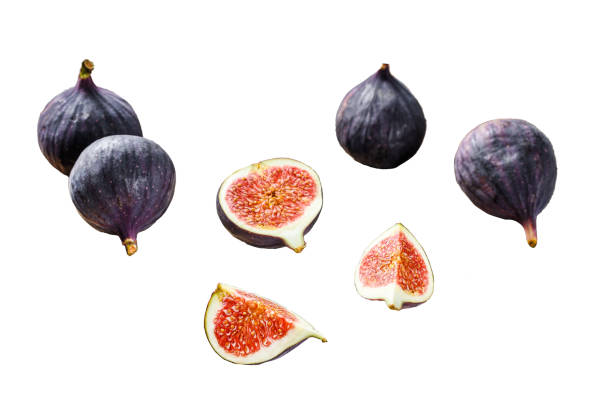 istock Ripe purple figs on a chopping Board.  Isolated on white background. Top view. 1969912791