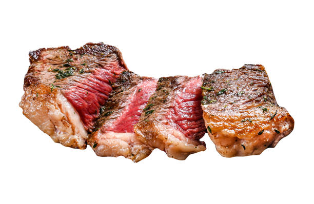 Grilled rump steak with potato, beef meat.  Isolated on white background. Top view