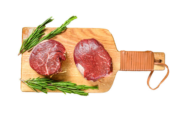 Juicy grilled beef medallion isolated on white