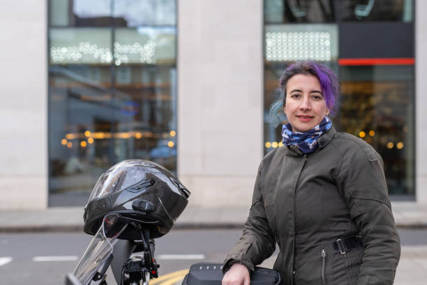 istock Woman with motorbike 1969916548