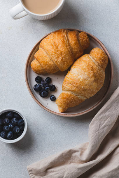 istock Croissants on a plate with blueberries 1969922332