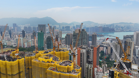 Aerial view of Cranes on a  construction site in ho man tin, Hong Kong - 01/27/2024 15:45:23 +0000.