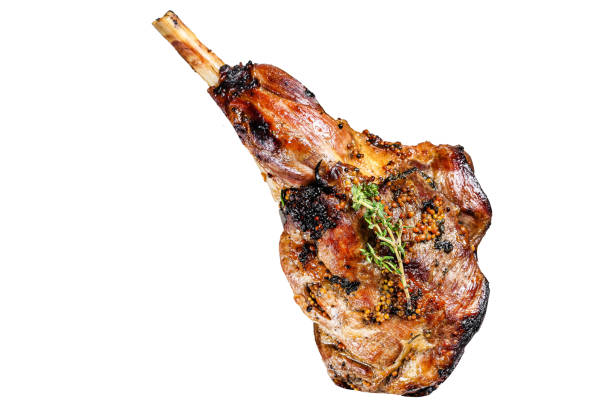 BBQ lamb leg with herbs. Isolated on white background. Top view