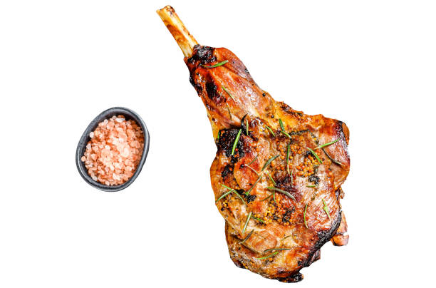 istock BBq Roasted goat leg. Farm meat.  Isolated on white background. Top view 1969943021