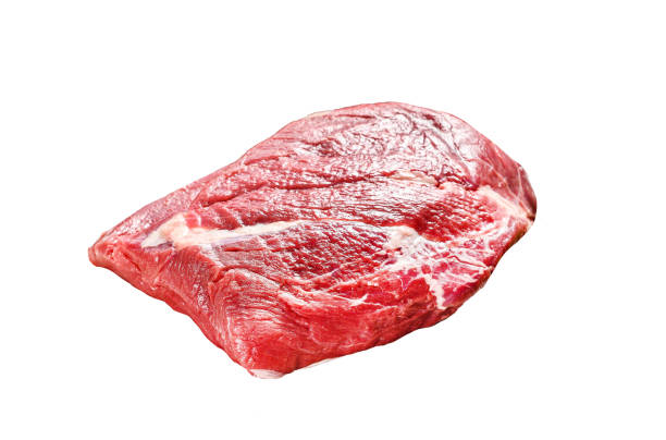 istock Raw brisket beef cut on a wooden cutting board. Black Angus beef.  Isolated on white background. Top view. 1969944661
