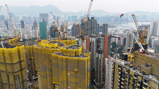 Aerial view of Cranes on a  construction site in ho man tin, Hong Kong - 01/27/2024 15:48:13 +0000.