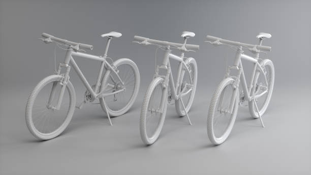 istock Three White Bicycle on a Soft Gray Studio Background. Sport concept. Monochrome. Perspective view. 1969964903