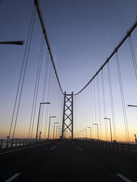 The Akashi Kaikyo Bridge is the world's longest suspension bridge, spanning the Akashi Strait connecting Kobe City, Japan, and Awaji Island. I photographed the bridge from the car.