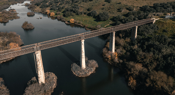 Old railway bridge over the Guadiana river valley in Serpa Portugal