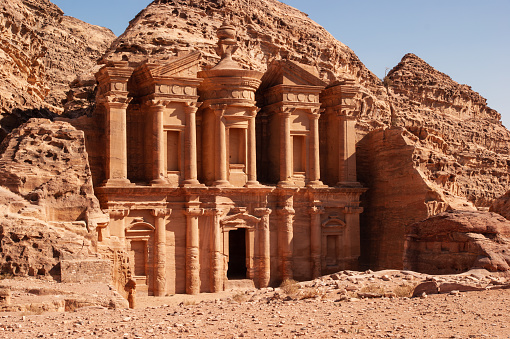 Jordan, Petra. Facade of Ad-Deir Monastery. Monastery, carved into sandy rocks, is one of most famous sights of Petra. Close-up. Facade of Ad-Deira resembles Treasury in a simplified version.