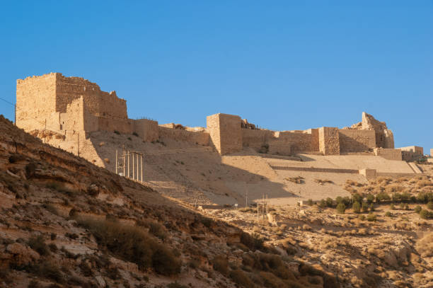 istock Jordan. Crusader castle El-Karak on mountain against blue December sky. Majestic and impregnable fortress of El-Karak or 