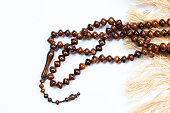 Islamic tasbih or prayer beads in an artistic way. The design concept has a Ramadan theme or other Islamic religious events