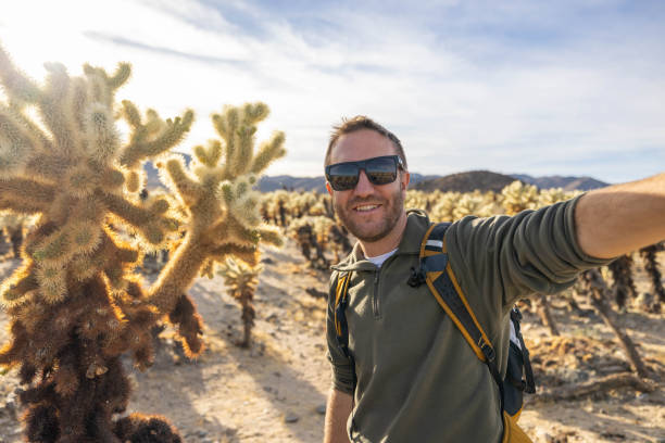 istock Sunny Selfie Trek: A Man Capturing California's Radiant Trails 1970083522