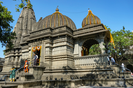 Nashik, India - January 24, 2024: People visiting the Kalaram Temple in Nashik, India.