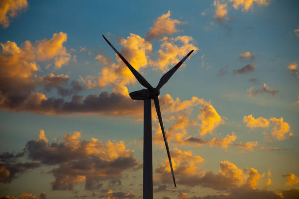 Symbol image: Wind turbines, wind farm at the sunrise (Composing)
