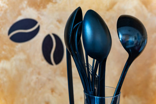 different cooking utensils in front of a wall in the kitchen