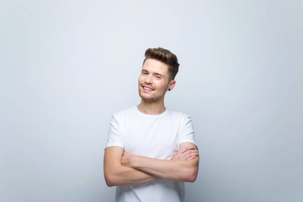 istock Portrait of pleased young man looking at camera 1970132607