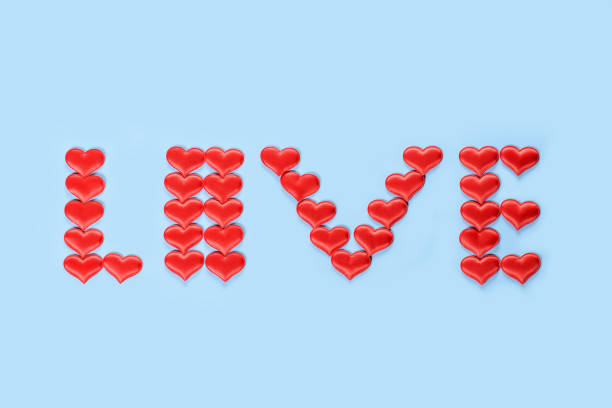 The word love from hearts on blue background. St. Valentine's Day.