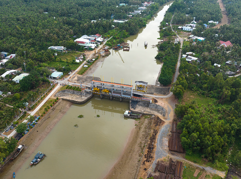 Saltwater prevention dam on a canal in Tien Giang province