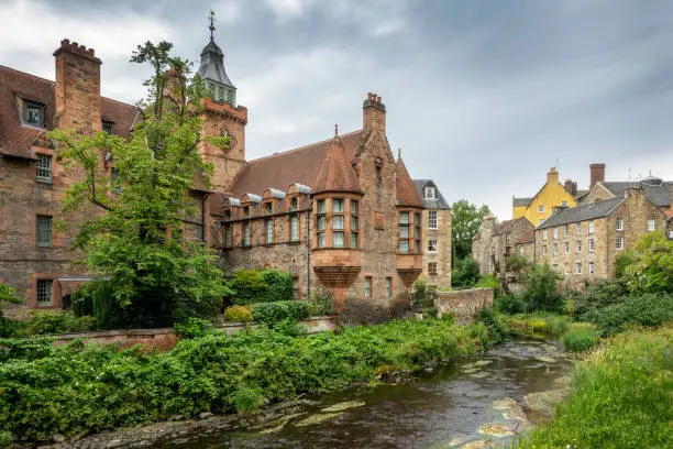 Photo of Dean village cityscape and Water of Leith river in Edinburgh Scotland