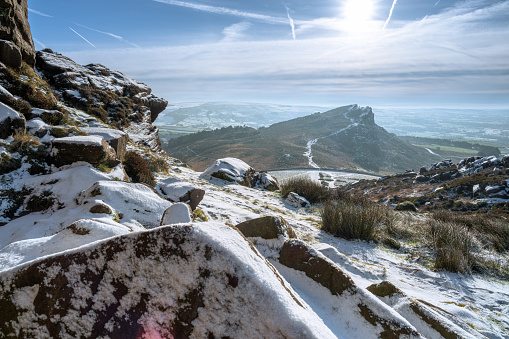 A rural Peak District National Park winter landscape scene. Panoramic view of Hen Cloud from The Roaches.